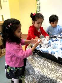 Children playing with flour pit.
