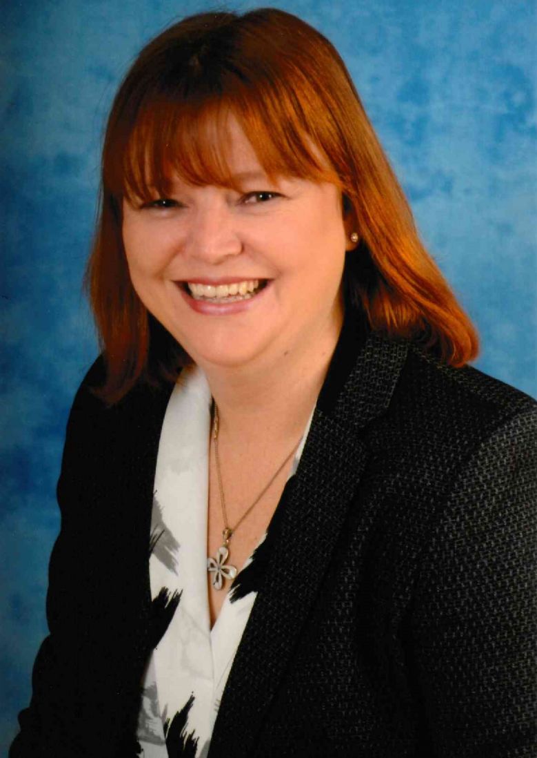 Mrs Shaw smiling.